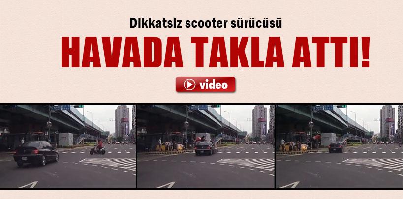 Japonya'da  scooter sürücü havada takla attı