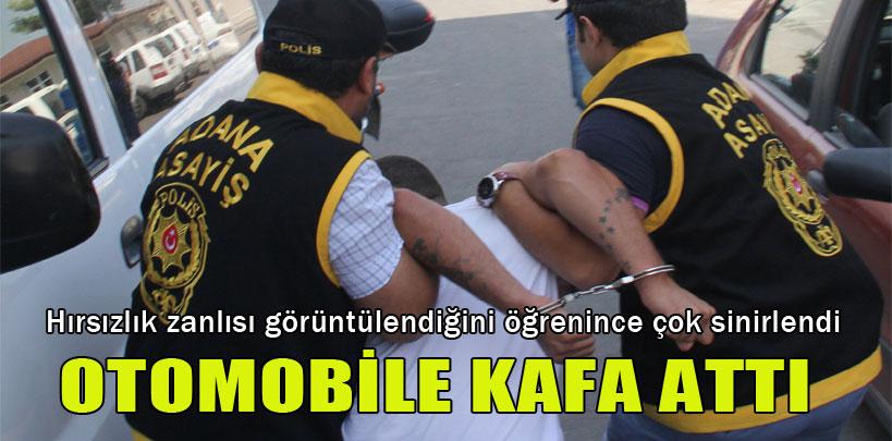 Hırsızlık zanlısı görüntülenince otomobile kafa attı