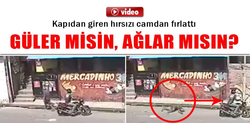 Kapıdan giren hırsızı camdan fırlattı