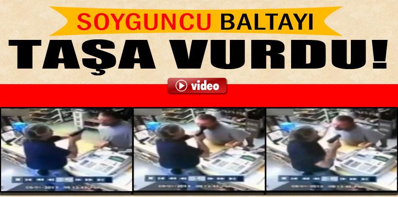 ABD'de Soyguncu baltayı taşa vurdu