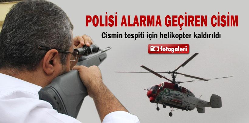 Teleferik direğinde sallanan cisim polisi alarma geçirdi