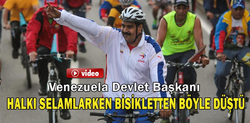 Venezuela Devlet Başkanı  halkı selamlarken bisikletten düştü